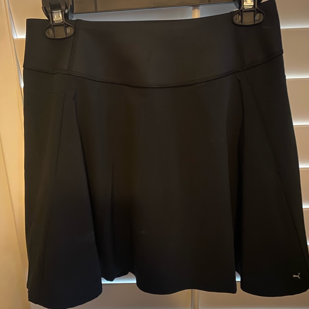Puma Ladies golf skirt. Never worn, NWT.